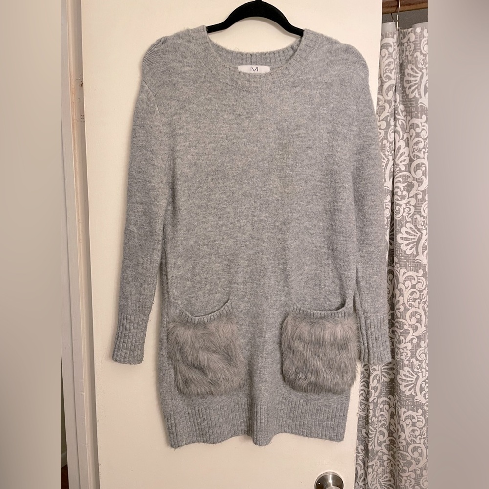 Beautiful Heather gray sweater dress with fuzzy pockets. Very warm and stylish.